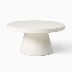 Round Concrete Pedestal Coffee T"Modern and durable, this round coffee table is made from glass fiber reinforced concrete composite—offering the look and strength of concrete with a lighter build. Designed for both indoor and outdoor use, it’s a versatile, weather-ready centerpiece. Dimensions: 32"" Diam. x 15"" H | Clearance: 13"" Packaged Weight: 107 lbs Assembly required."able